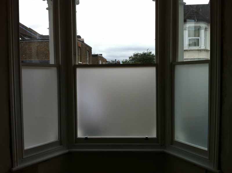 Existing original frame has had double glazed sash windows fitted with lower, internal pane frosted for extra privacy