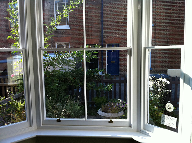 Freshly decorated sash windows sticking