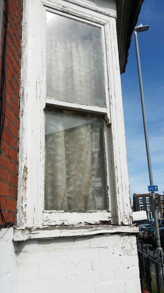 Repair sash windows side of bay