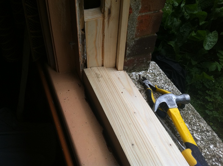 Sash window sill housed in using traditional joinery technique