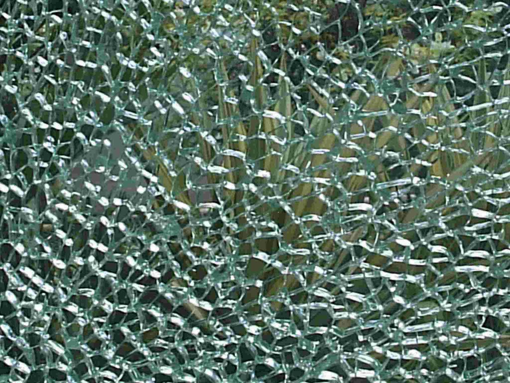 Toughened glass breaking into many small pieces