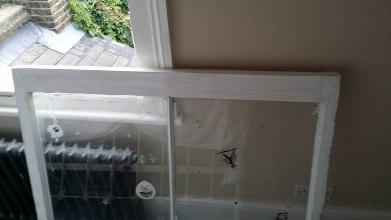 Earlsfield and Wimbledon Sash window lower rail replacement primed and undercoated