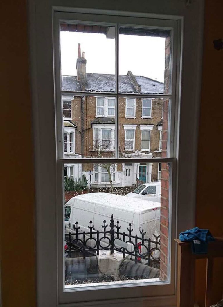 Original sash window double glazed and built back in situ with a