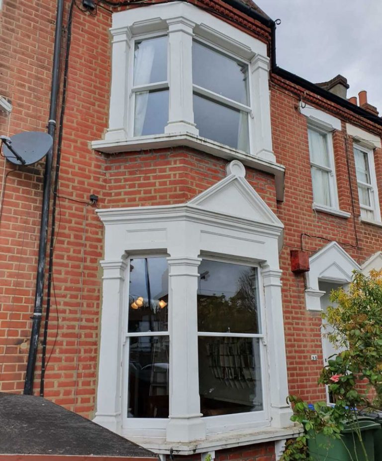 External view of the double glazed bay sash windows fully reinstated
