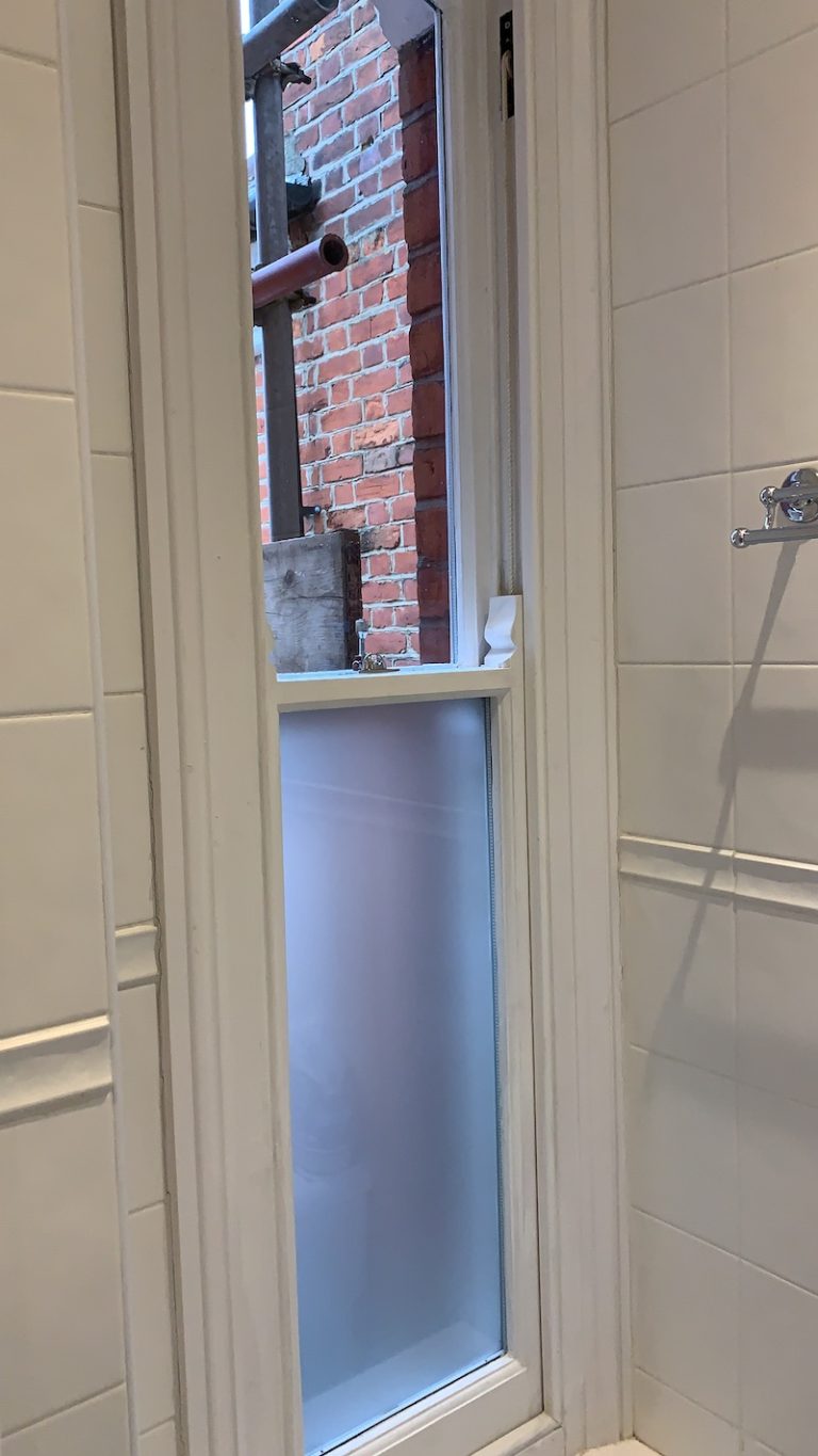 A sash window that has had the double glazing existing process complete