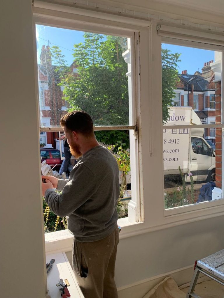 Removing the sashes ready for double glazing the existing London Sash